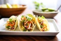 handheld asian slaw tacos, fresh veggie filling
