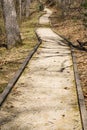 A Handicap Accessible Walking Path through the Woods Royalty Free Stock Photo