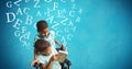 Handicap boy and brother reading book with alphabets flying over blue background Royalty Free Stock Photo