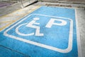 Handicap parking. Blue Disabled parking sign on asphalt, special place. Royalty Free Stock Photo