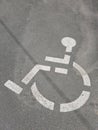 Handicap sign in a parking lot Royalty Free Stock Photo