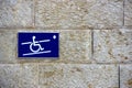 Handicap sign on a wall Royalty Free Stock Photo
