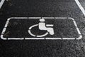 Handicap symbol on road. Road marking on the asphalt with parking spaces for the disabled. Royalty Free Stock Photo