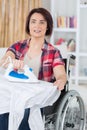 Handicaped person must do housekeeping herself Royalty Free Stock Photo