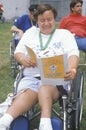 Handicapped Athlete cheering at finish line