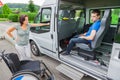 Handicapped boy is picked up by school bus