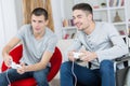 handicapped boys play in room video games