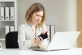 Handicapped businesswoman working at office