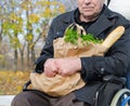 Handicapped man doing his grocery shopping Royalty Free Stock Photo