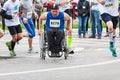 Handicapped man in marathon on a wheelchair