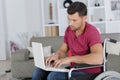 Handicapped man using laptop Royalty Free Stock Photo