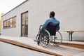 Handicapped man using wheelchair ramp Royalty Free Stock Photo