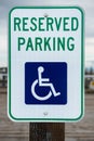 Handicapped parking spot. Blue handicapped sign parking spot. Disabled parking permit sign on pole Royalty Free Stock Photo