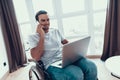 Handicapped Person in Wheelchair Talking Phone
