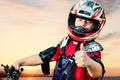 Handicapped quad bike rider doing thumbs up. Royalty Free Stock Photo