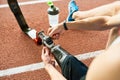 Handicapped Sportsman Fixing Artificial Limb