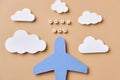 Handicraft from colorful paper Airplane and clouds Royalty Free Stock Photo