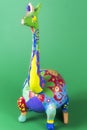 Handicraft, craftwork, workmanship, giraffe, camelopard, colorful, colourful, colored, green background