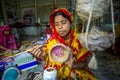 Handicraft maker women are making on a showpiece bird nests using on pineapple fiber at Madhupur, Royalty Free Stock Photo