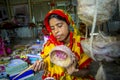 Handicraft maker women are making on a showpiece bird nests using on pineapple fiber at Madhupur, Royalty Free Stock Photo