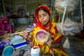 Handicraft maker women are making on a showpiece bird nests using on pineapple fiber at Madhupur, Royalty Free Stock Photo