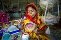 Handicraft maker women are making on a showpiece bird nests using on pineapple fiber at Madhupur, Royalty Free Stock Photo