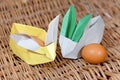 Handicraft origami rabbits from paper. Easter bunnies. Creative package for gift Royalty Free Stock Photo