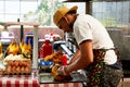 Young Colombian chef preparing a typical dish