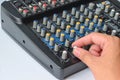 Handing control vollume of mixer Royalty Free Stock Photo