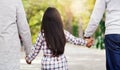 Handing down our love form one generation to the next. Rearview shot of an unrecorgnizable little girl holding hands Royalty Free Stock Photo