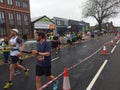 Handing out water at Manchester Marathon 2023