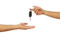 Handing over the car key. Hands isolated on white background, clipping path Royalty Free Stock Photo