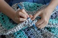 Handiwork. Knitting. Handmade. Girl crocheting floor Mat Royalty Free Stock Photo