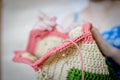 Handiwork. Knitting. Handmade. A girl crochets a colored bag Royalty Free Stock Photo