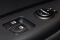 Handle on the door, car window control panel Royalty Free Stock Photo