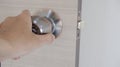 Handle door knob and open or close the door Royalty Free Stock Photo