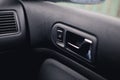 Handle door opening in the vehicle. Window button. Royalty Free Stock Photo