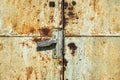 Doorknob on an old rusty metal door Royalty Free Stock Photo