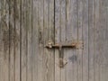 Handle on the old wooden door Royalty Free Stock Photo