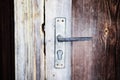 Handle on the old wooden door Royalty Free Stock Photo
