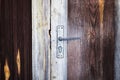 Handle on the old wooden door Royalty Free Stock Photo