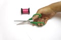 Handle scissors cuting pink Sewing thread