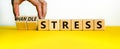Handle stress symbol. Businessman turns cubes and changes words `stress` to `handle stress`. Beautiful yellow table, white