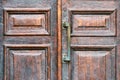 Handle of a vintage wooden door close up Royalty Free Stock Photo