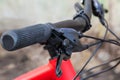 Handlebar with brake levers of bicycle, close-up in selective focus Royalty Free Stock Photo