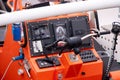 Handlebar and electronic equipment at the control panel of the dinghy of the rescue cruiser Pidder Lueng, Sylt, Germany Royalty Free Stock Photo