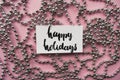 Handlettering words happy holidays and christmas garland