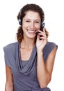 Handling customers like a pro. Studio shot of a friendly female customer service representative wearing a headset. Royalty Free Stock Photo