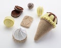 Handmade amigurumi knitted toys. Cute lemon and chocolate ice cream, cookies and macarons toys. Crochet miniature stuffed sweets Royalty Free Stock Photo