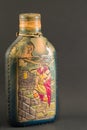 handmade antique bottle, filled with Peruvian pisco